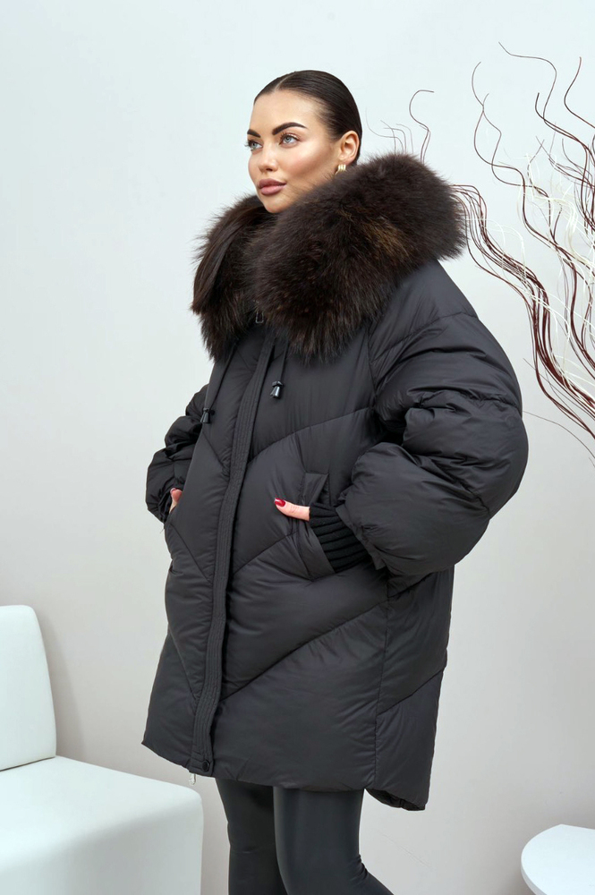 Теплый женский пуховик средней длинны